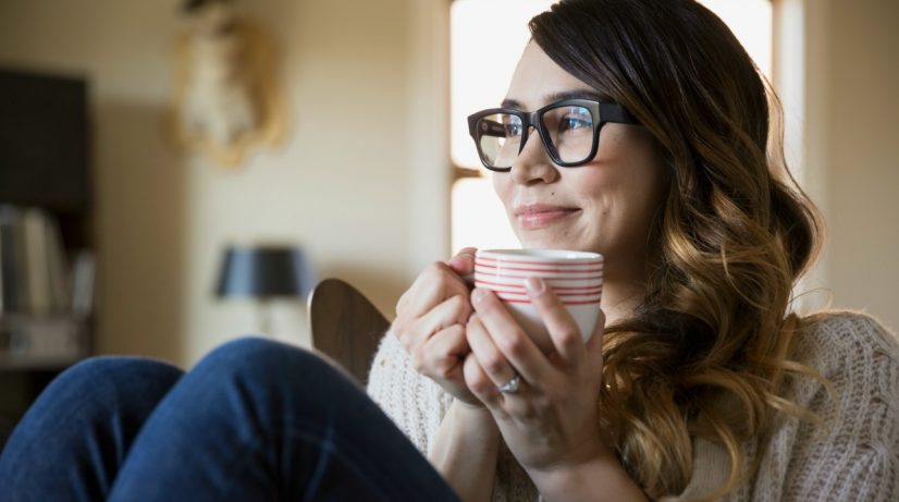 Woman Drinking at Home Photo