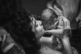 Newborn baby with mother