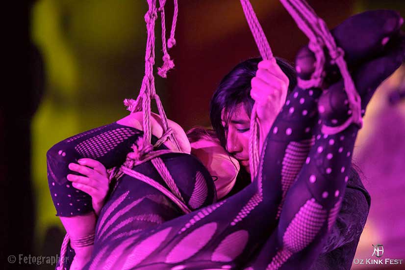 Shibari performer