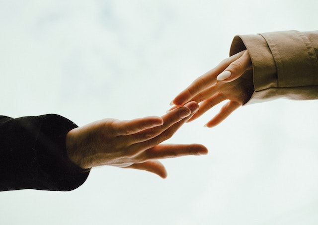 couple touching fingers