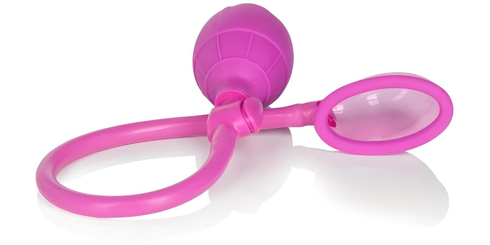 Compact silicone clitoral pump with a transparent suction cup and manual hand bulb