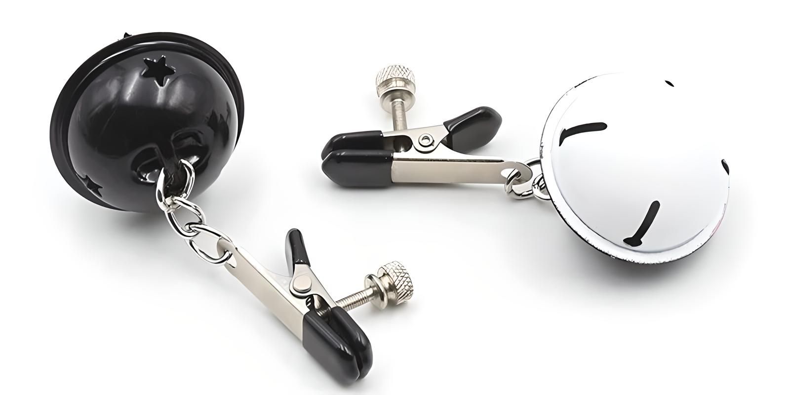 Adjustable silver nipple clamps with decorative ball weights for added sensation